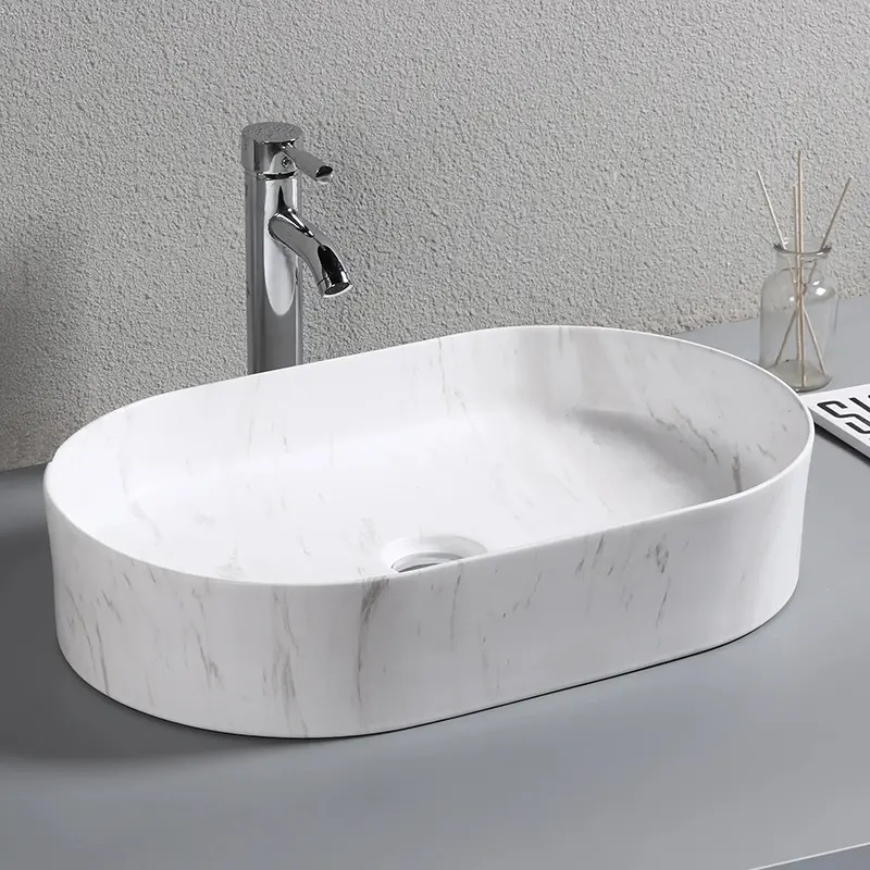 Раковина накладная Ceruttispa CR0055B MMW1 мрамор белый матовый, овальная, 50х35х12 см