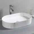 Раковина накладная Ceruttispa CR0055B MMW1 мрамор белый матовый, овальная, 50х35х12 см