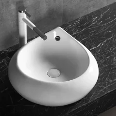 Раковина накладная Ceruttispa CR045E в форме капли, белая, с переливом, 47.5х47х15 см