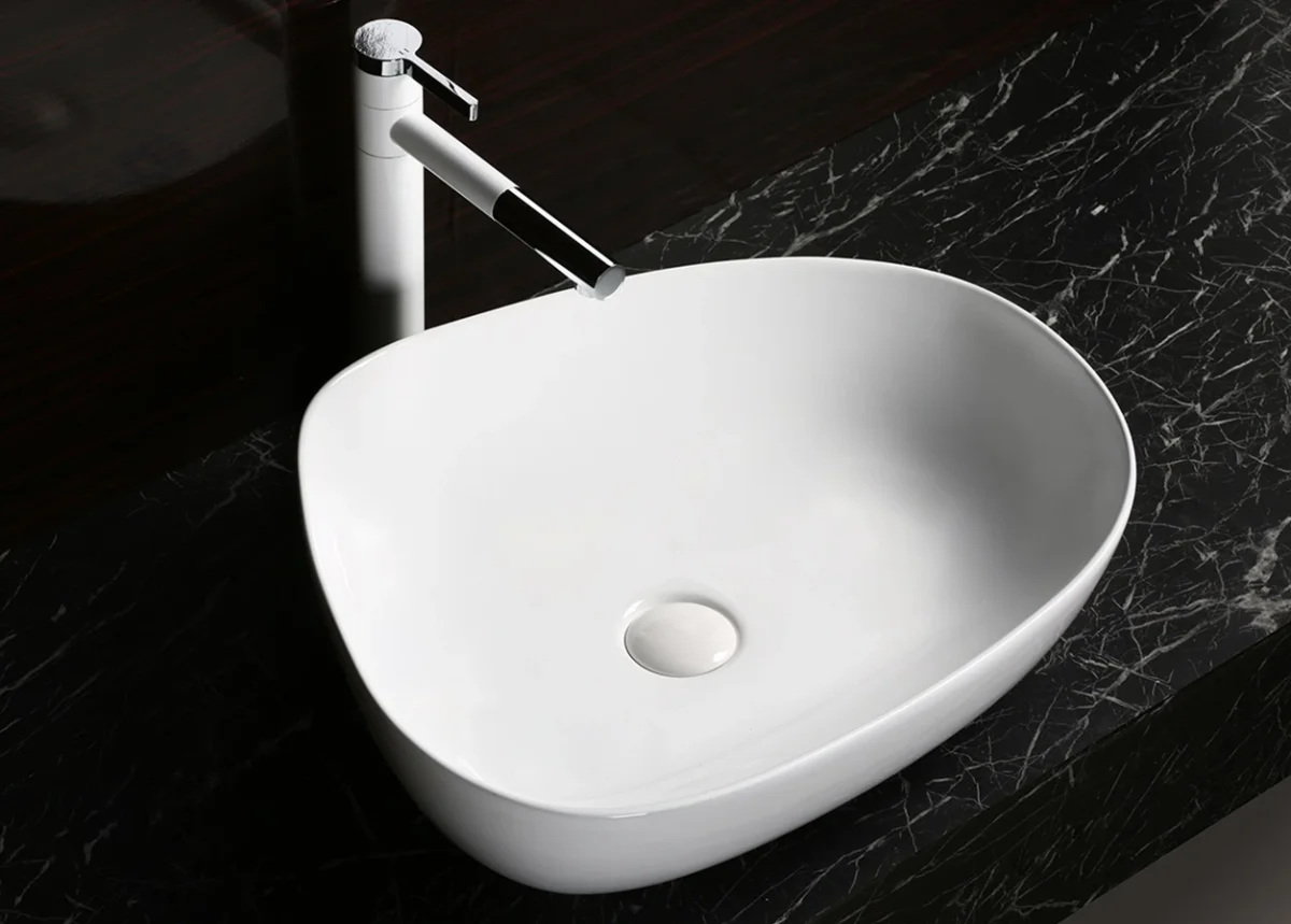 Раковина накладная Ceruttispa CR0044 асимметричная, белая 55х42х14 см